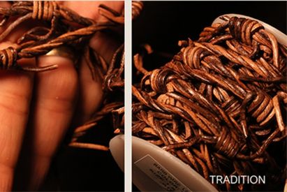 Close up of barbed wire leather cords